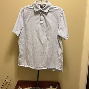 Kirkland shirt sleeve three button polo shirt.